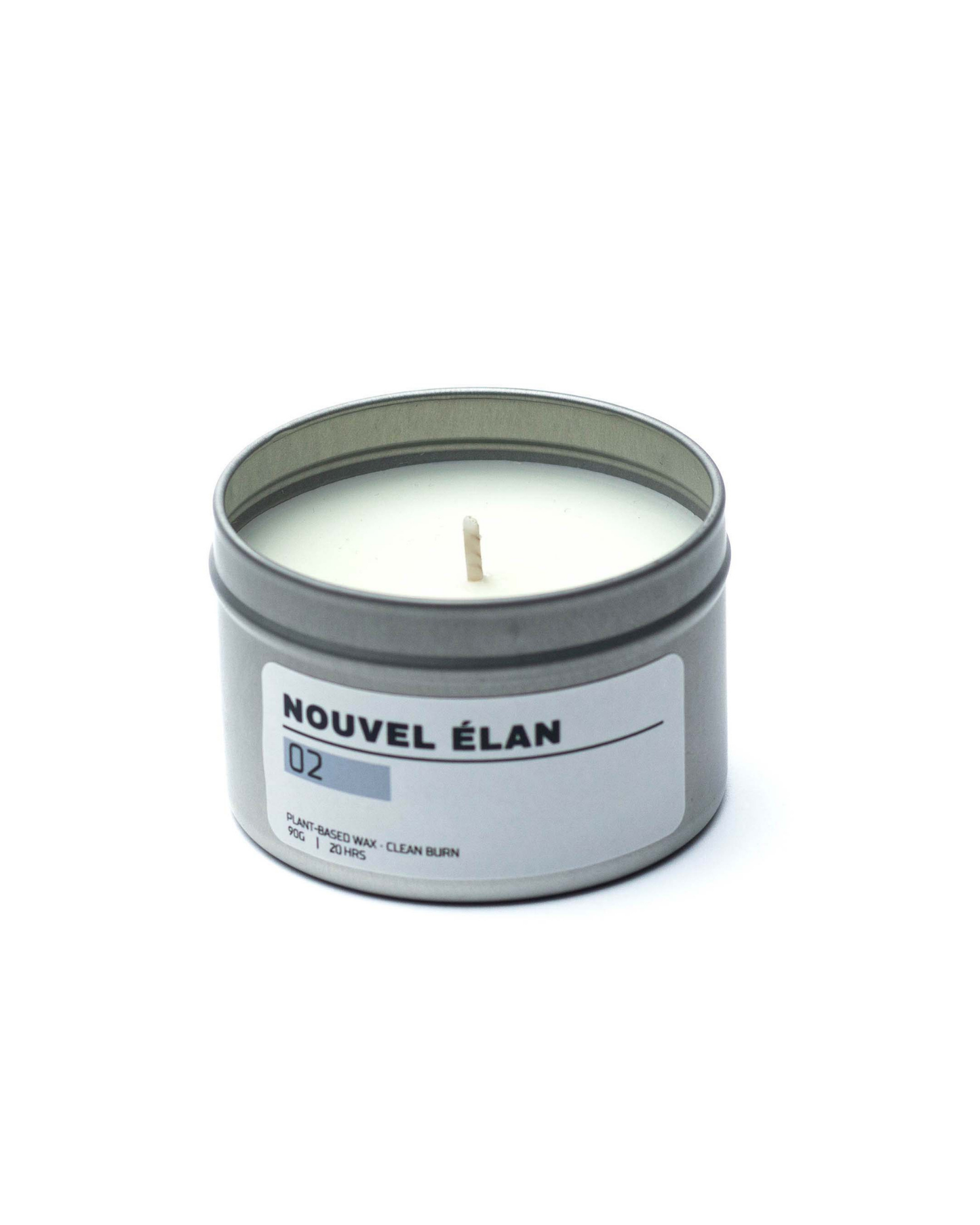 Candle in a tin container labeled 'Nouvel élan' on a white background
