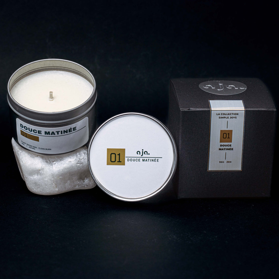 Handmade vegetable wax scented candle in a metal travel tin