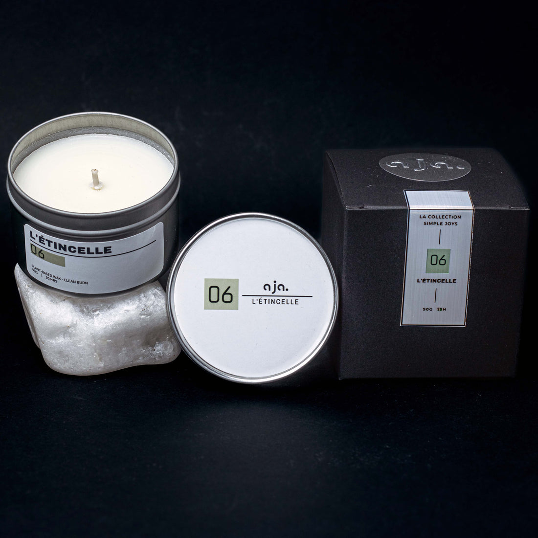 L'Étincelle citrus mango lime scented candle in a travel tin