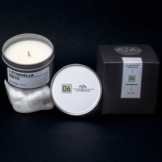 L'Étincelle citrus mango lime scented candle in a travel tin