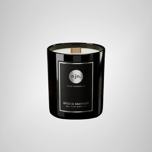 Aja Home Fragrances vegetable wax scented candle in a 220g glass jar with wooden wick