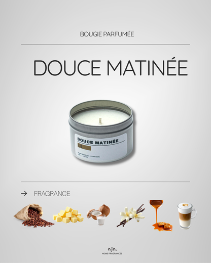 Candle labeled 'Douce Matinée' with fragrance elements on a gray background