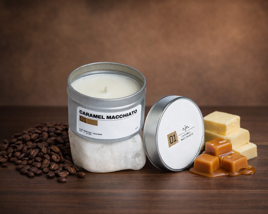 Caramel Macchiato candle with coffee beans and caramels on a wooden surface