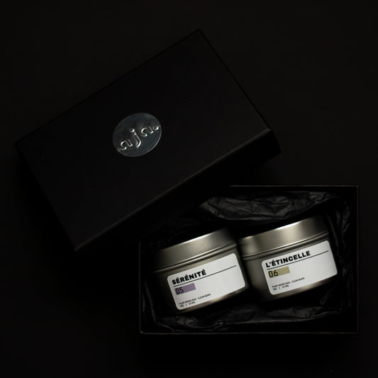 Duo Set Candles for productivity and relaxation. Black background of black box and candles