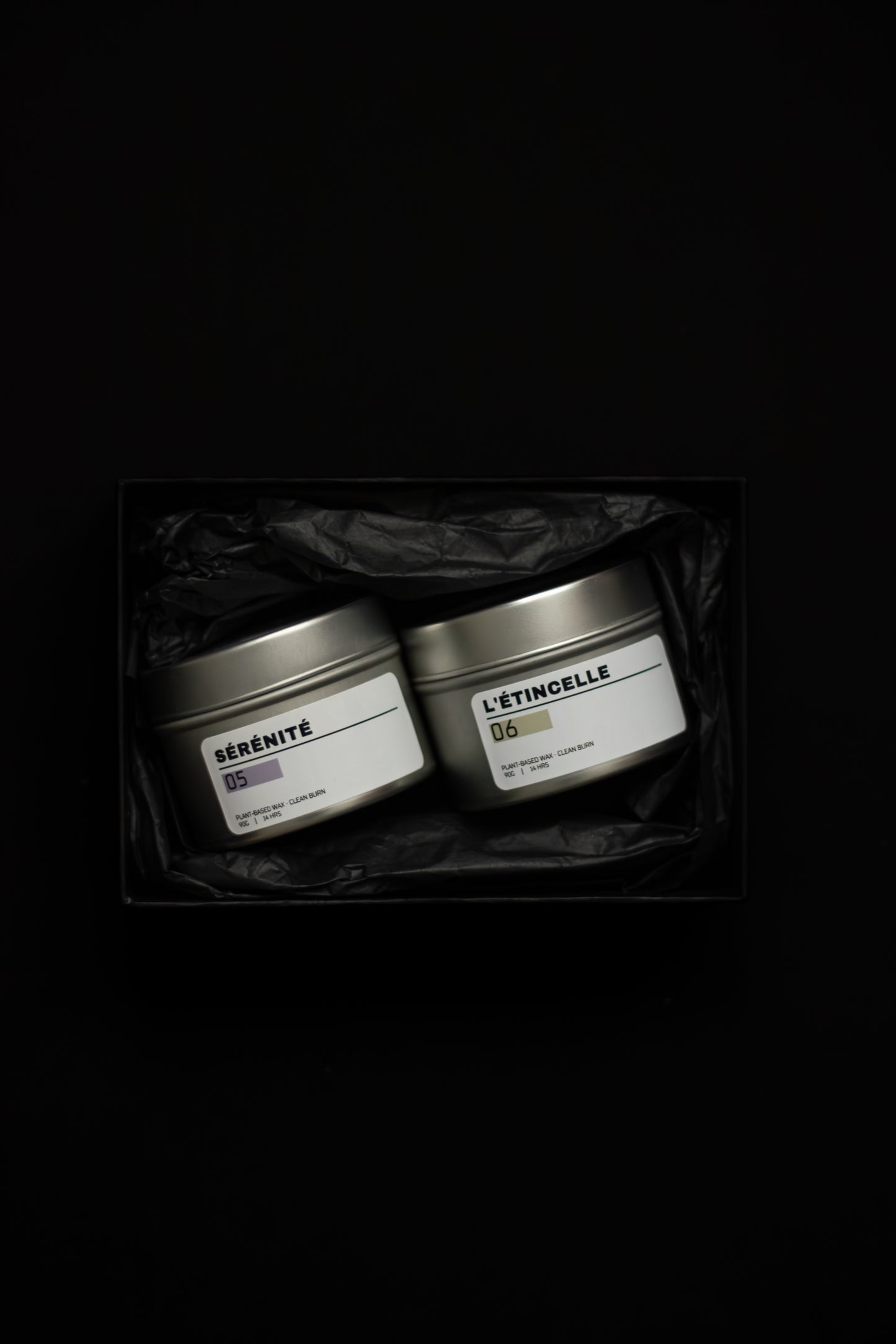 Gift box with two scented candles looking prelium and luxury.