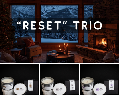 Cozy living room with mountain view and candles labeled 'RESET TRIO'. Bundle deal of relaxing scents of Aja Home Fragrances